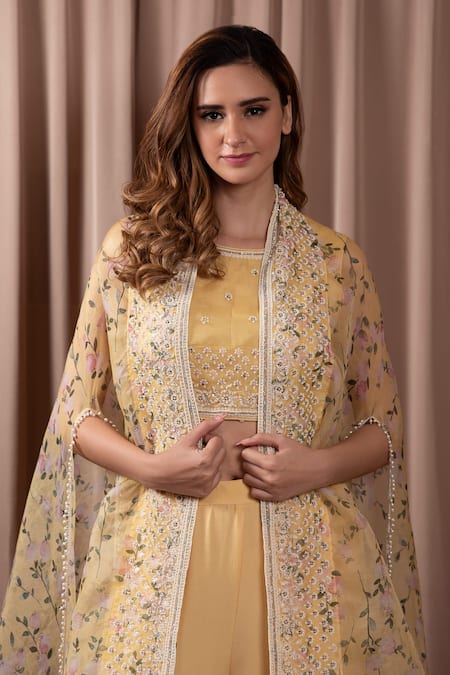Buy_Vara By Vibha N Priti_Yellow Chiffon, Organza Bahar Print Embellished Asymmetric Cape Sharara Set _Online_at_Aza_Fashions