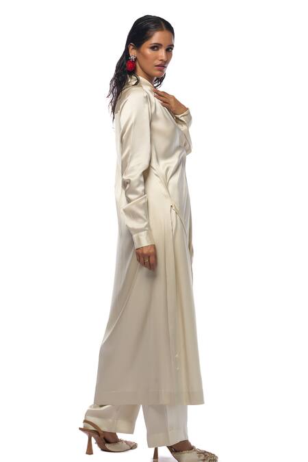 Shop AK-OK Cream Silk Collared Asymmetric Buttoned Panel Long Shirt Jacket With Trouser Online at Aza Fashions Shop_AK-OK_Cream Silk Collared Asymmetric Buttoned Panel Long Shirt Jacket With Trouser _Online_at_Aza_Fashions