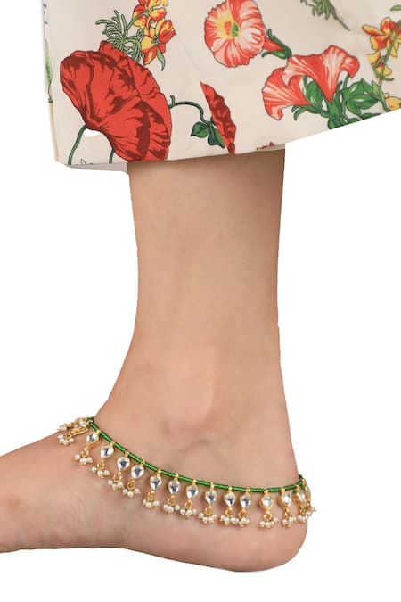 Shop Riana Jewellery White Kundan And Pearl Embellished Payal Set Of 2 at Aza Fashions Shop_Riana Jewellery_White Kundan And Pearl Embellished Payal Set Of 2 _at_Aza_Fashions