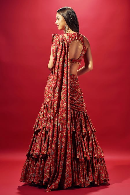 Shop Sammohi By Moksha And Hiral Red Crepe, Silk Beads Round Pre-draped Floral Print Ruffled Saree With Blouse at Aza Fashions Shop_Sammohi By Moksha And Hiral_Red Crepe, Silk Beads Round Pre-draped Floral Print Ruffled Saree With Blouse _at_Aza_Fashions