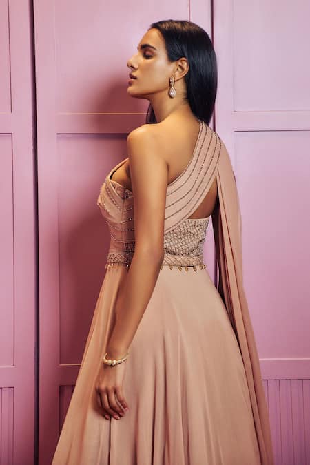 Shop Sammohi By Moksha And Hiral Pink Georgette Crystals Asymmetric Placement Hand Embroidered Gown at Aza Fashions Shop_Sammohi By Moksha And Hiral_Pink Georgette Crystals Asymmetric Placement Hand Embroidered Gown _at_Aza_Fashions
