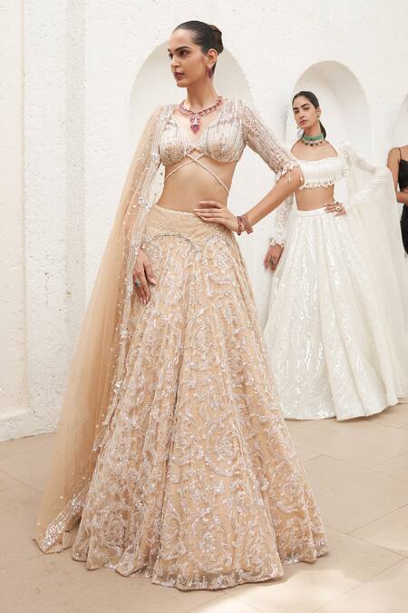 Buy Mahima Mahajan Beige Net Embroidered Crystal Plunge V-neck Samia Swirl Lehenga Set Online at Aza Fashions Buy_Mahima Mahajan_Beige Net Embroidered Crystal Plunge V-neck Samia Swirl Lehenga Set_Online_at_Aza_Fashions