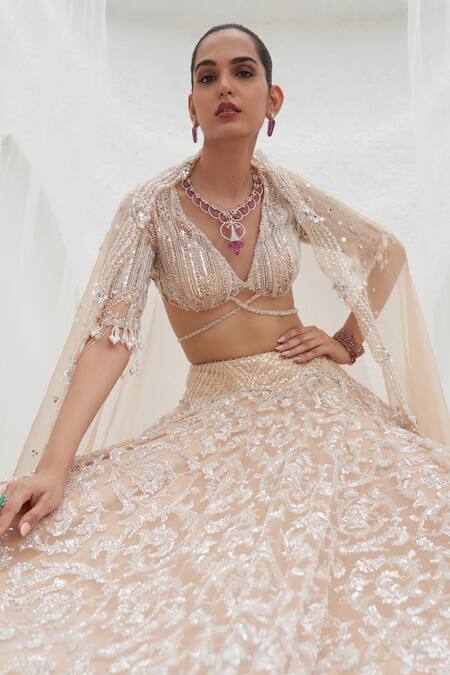 Buy Mahima Mahajan Beige Net Embroidered Crystal Plunge V-neck Samia Swirl Lehenga Set Buy_Mahima Mahajan_Beige Net Embroidered Crystal Plunge V-neck Samia Swirl Lehenga Set