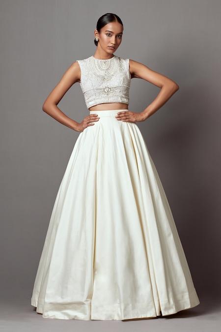 Mala and Kinnary Ivory Taffeta Embroidered Stone Embellished Blouse With Solid Lehenga 