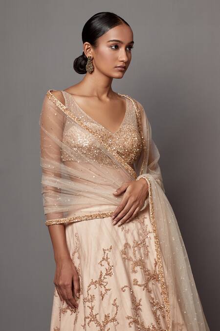 Shop Mala And Kinnary Beige Net Sequins, Crystals V-neck Embellished Baroque Bridal Lehenga Set Online at Aza Fashions Shop_Mala And Kinnary_Beige Net Sequins, Crystals V-neck Embellished Baroque Bridal Lehenga Set_Online_at_Aza_Fashions