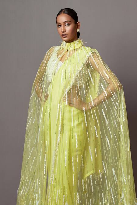 Mala And Kinnary_Yellow Georgette, Net Pearls, Sequins Stripe Feather Embellished Cape Saree Set_Online_at_Aza_Fashions