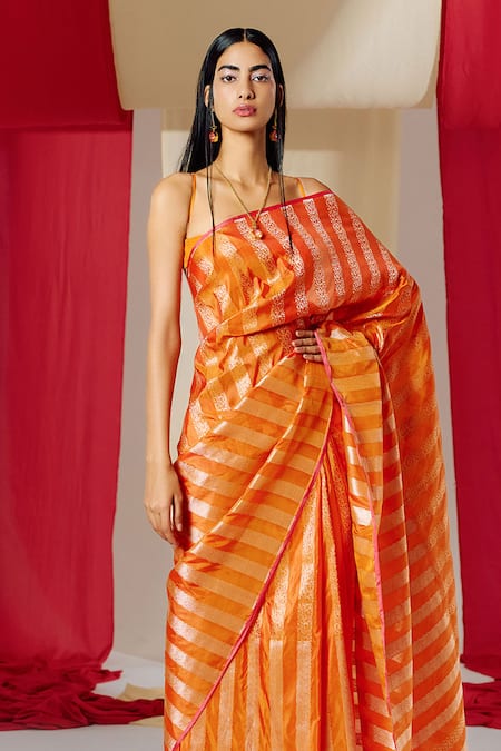 Buy_Ekaya Banaras_Orange Silk Floral Stripe Pattern Saree With Unstitched Blouse Piece _Online_at_Aza_Fashions