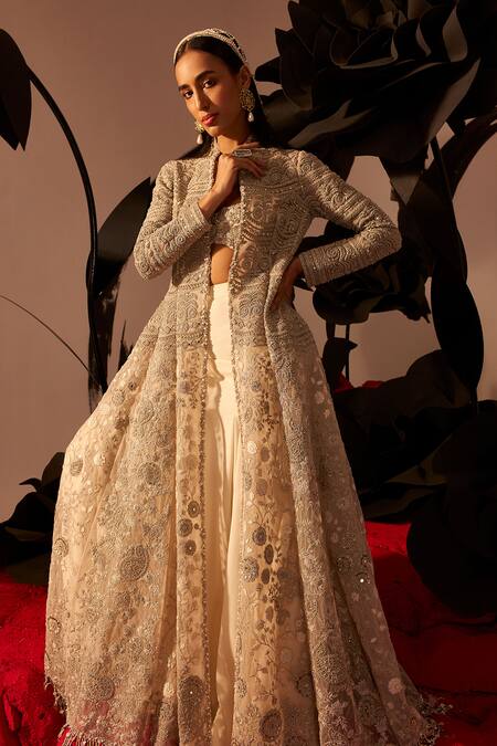 Bhumika Sharma_Ivory Net, Georgette Pearls, Sequins Paisley Embroidered Jacket Solid Skirt Set_Online_at_Aza_Fashions