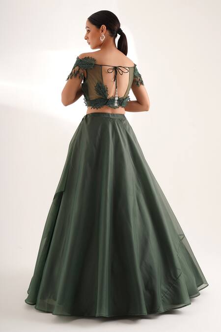 Shop Chaashni By Maansi And Ketan Green Organza Crystals, Draped Solid Lehenga Set With Leaf Embellished Blouse at Aza Fashions Shop_Chaashni By Maansi And Ketan_Green Organza Crystals, Draped Solid Lehenga Set With Leaf Embellished Blouse_at_Aza_Fashions