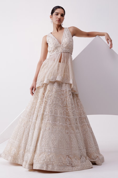 Shop Istya Beige Net Sequins, Beads V-neck Embroidered Lehenga And Peplum Jacket Set at Aza Fashions Shop_Istya_Beige Net Sequins, Beads V-neck Embroidered Lehenga And Peplum Jacket Set _at_Aza_Fashions