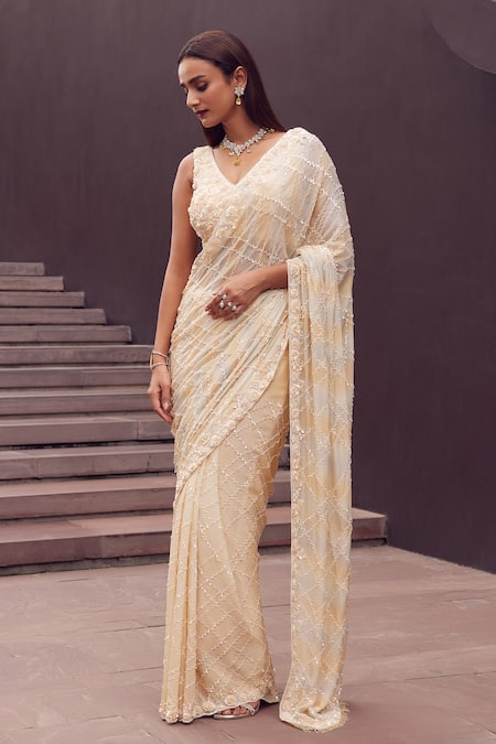 Shop Istya Beige Chiffon Sequins, Beads V-neck Geometric Embroidered Saree With Blouse at Aza Fashions Shop_Istya_Beige Chiffon Sequins, Beads V-neck Geometric Embroidered Saree With Blouse _at_Aza_Fashions