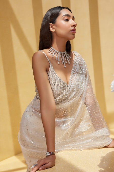 Buy Istya Ivory Organza, Tissue Sequins, Stones Plunge Neck Embellished Saree Set Online at Aza Fashions Buy_Istya_Ivory Organza, Tissue Sequins, Stones Plunge Neck Embellished Saree Set _Online_at_Aza_Fashions