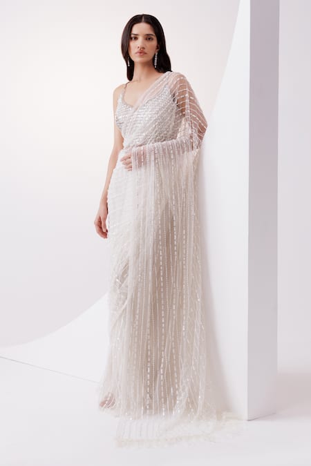 Istya Ivory Net Sequins, Stones And Embellished Saree With Blouse Online at Aza Fashions Istya_Ivory Net Sequins, Stones And Embellished Saree With Blouse _Online_at_Aza_Fashions