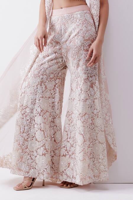 Shop Istya Peach Net Sequins, Beads, Cut Floral Applique Embroidered Sharara And Jacket Set Online at Aza Fashions Shop_Istya_Peach Net Sequins, Beads, Cut Floral Applique Embroidered Sharara And Jacket Set _Online_at_Aza_Fashions