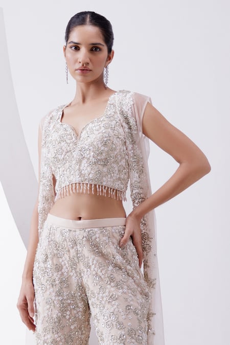 Istya_Peach Net Sequins, Beads, Embroidery Sweetheart Neck, Rose Sharara And Jacket Set _Online_at_Aza_Fashions