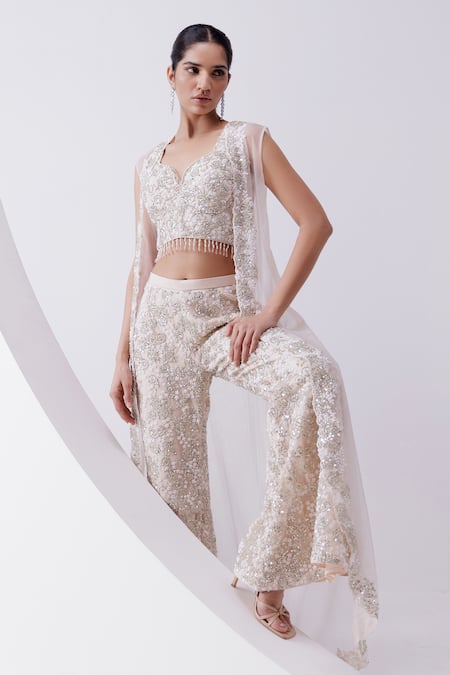 Istya_Peach Net Sequins, Beads, Embroidery Sweetheart Neck, Rose Sharara And Jacket Set _at_Aza_Fashions