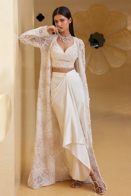 Istya_Ivory Net, Satin Sequins, Beads, Tassels Embroidered Jacket And Draped Skirt Set _Online_at_Aza_Fashions