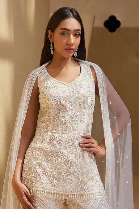 Buy_Istya_Ivory Net Beads, Sequins, Tassels Boat Neck Floral Embroidered Kurta Sharara Set _Online_at_Aza_Fashions