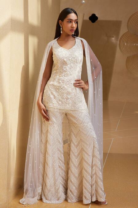 Shop_Istya_Ivory Net Beads, Sequins, Tassels Boat Neck Floral Embroidered Kurta Sharara Set _Online_at_Aza_Fashions