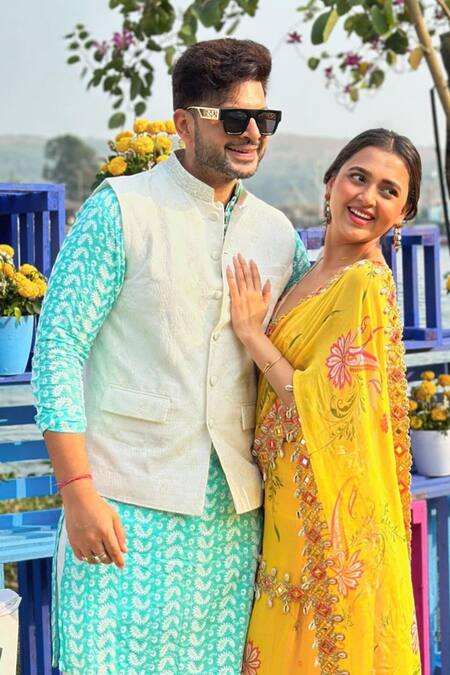 Foram Patel Yellow Georgette, Net Paisley Print Mermaid Pre-draped Saree With Blouse at Aza Fashions Foram Patel_Yellow Georgette, Net Paisley Print Mermaid Pre-draped Saree With Blouse_at_Aza_Fashions