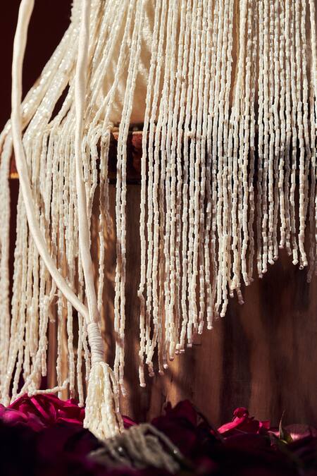 Aamli_Off White Cut Work Gulli Cutdana Fringe Embellished Potli Bag _Online_at_Aza_Fashions