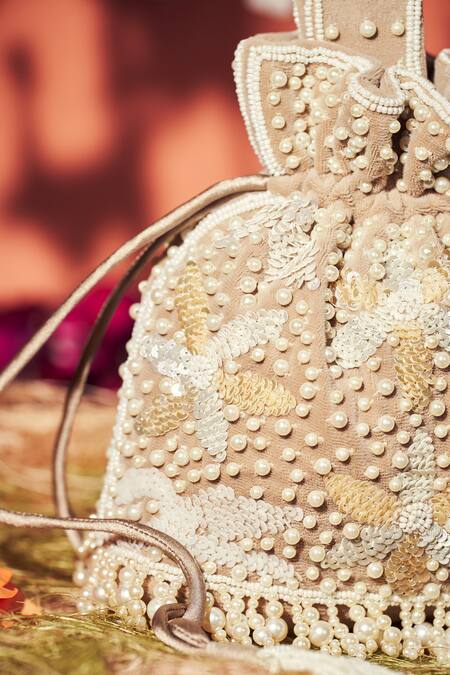 Buy Aamli Beige Sequins, Beads, Pearls Phool Embellished Potli Bag Online at Aza Fashions Buy_Aamli_Beige Sequins, Beads, Pearls Phool Embellished Potli Bag _Online_at_Aza_Fashions