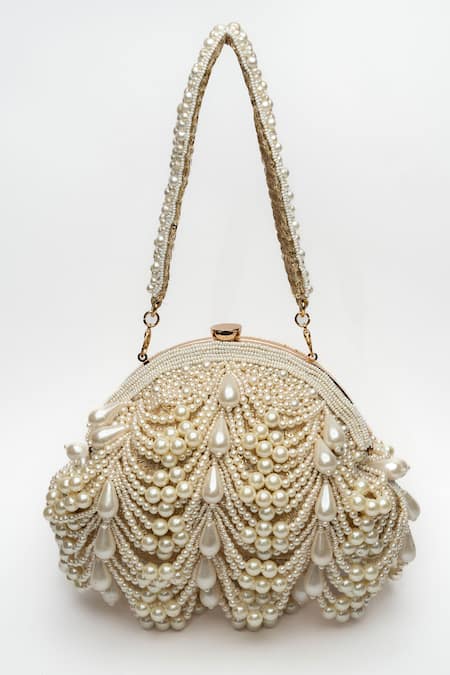 Shop Nayaab By Sonia Gold Pearls, Beads Oyster Frame Scallop Embellished Potli at Aza Fashions Shop_Nayaab By Sonia_Gold Pearls, Beads Oyster Frame Scallop Embellished Potli _at_Aza_Fashions