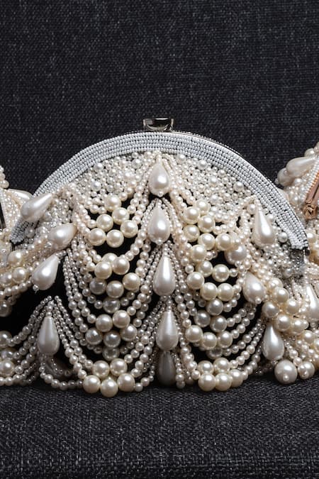 Nayaab By Sonia Gold Pearls, Beads Oyster Frame Scallop Embellished Potli at Aza Fashions Nayaab By Sonia_Gold Pearls, Beads Oyster Frame Scallop Embellished Potli _at_Aza_Fashions