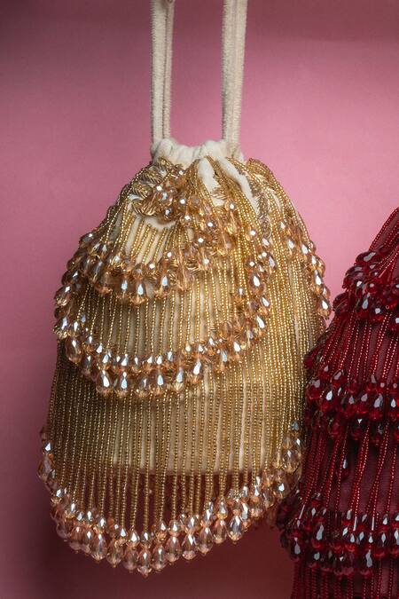 Buy Nayaab By Sonia Gold Crystals Pristine Raindrops Pearl Embellished Potli Online at Aza Fashions Buy_Nayaab By Sonia_Gold Crystals Pristine Raindrops Pearl Embellished Potli _Online_at_Aza_Fashions