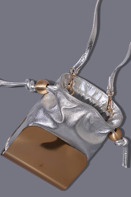 Buy_Tann-ED_Silver Plain Leather Moulded Potli _Online_at_Aza_Fashions