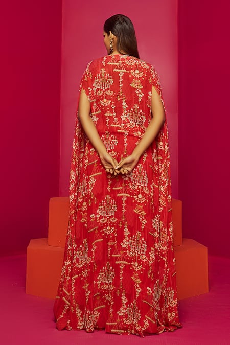 Shop Krisha Sunny Ramani Red Crepe, Georgette Embroidery, Sequins, Cut Chandelier Print Cape Lehenga Set at Aza Fashions Shop_Krisha Sunny Ramani_Red Crepe, Georgette Embroidery, Sequins, Cut Chandelier Print Cape Lehenga Set _at_Aza_Fashions