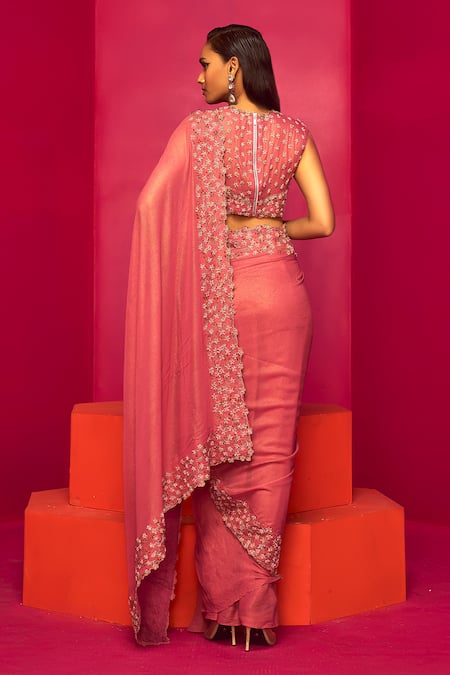 Shop Krisha Sunny Ramani Pink Georgette Sequins, Border Embroidered Pre-draped Saree With Blouse at Aza Fashions Shop_Krisha Sunny Ramani_Pink Georgette Sequins, Border Embroidered Pre-draped Saree With Blouse _at_Aza_Fashions
