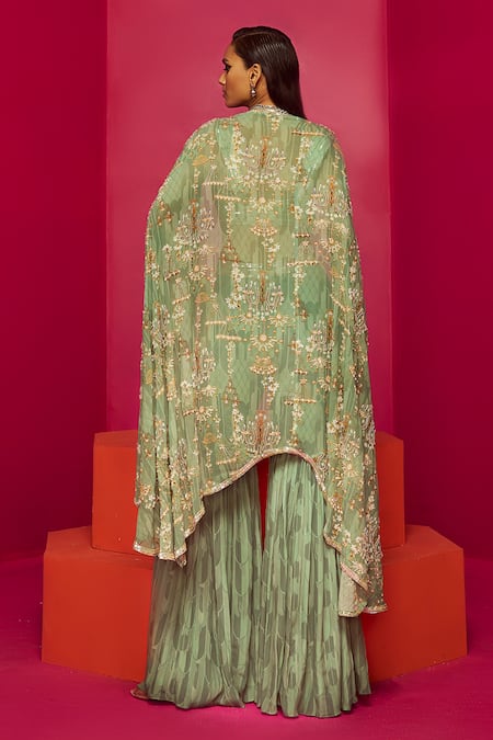 Shop Krisha Sunny Ramani Green Crepe, Georgette Crystals, Sequins, Cut Chandelier Print Cape Gharara Set at Aza Fashions Shop_Krisha Sunny Ramani_Green Crepe, Georgette Crystals, Sequins, Cut Chandelier Print Cape Gharara Set _at_Aza_Fashions