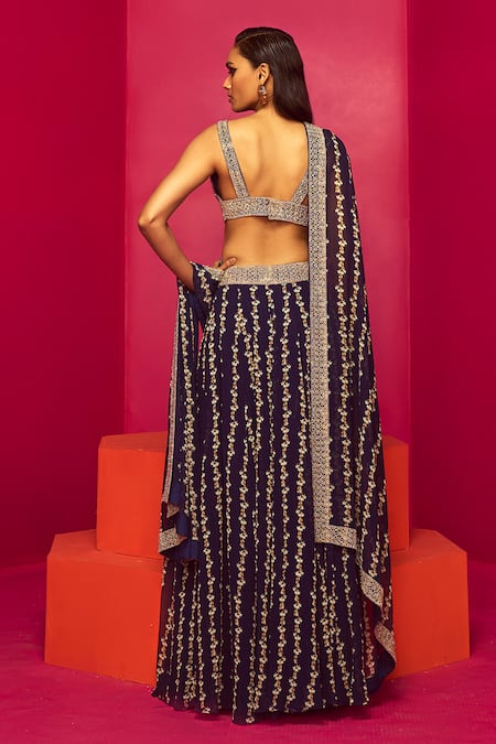 Shop Krisha Sunny Ramani Blue Georgette Sequins, Cut Work, Beads, Embroidery Square Neck Blouse Skirt Set at Aza Fashions Shop_Krisha Sunny Ramani_Blue Georgette Sequins, Cut Work, Beads, Embroidery Square Neck Blouse Skirt Set _at_Aza_Fashions
