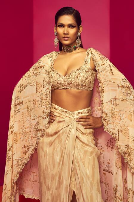 Buy Krisha Sunny Ramani Ivory Crepe, Georgette Sequins, Beads Chandelier Print Cape Dhoti Skirt Set Online at Aza Fashions Buy_Krisha Sunny Ramani_Ivory Crepe, Georgette Sequins, Beads Chandelier Print Cape Dhoti Skirt Set _Online_at_Aza_Fashions