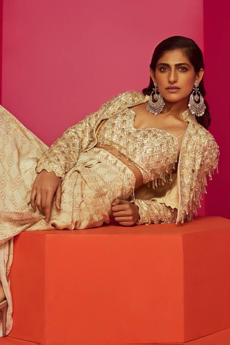 Krisha Sunny Ramani Ivory Crepe, Georgette Sequins, Crystals, Embellished Jacket Dhoti Skirt Set at Aza Fashions Krisha Sunny Ramani_Ivory Crepe, Georgette Sequins, Crystals, Embellished Jacket Dhoti Skirt Set _at_Aza_Fashions