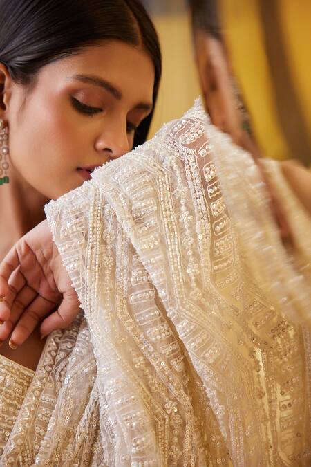 Buy_Istya_Ivory Net, Satin Cut Work, Sequins, Embroidered Draped Saree Lehenga With Blouse _Online_at_Aza_Fashions