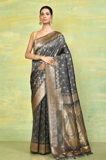 Cream intricate Mughal style position woven Russian silk saree, Mughal style motifs position woven border, pallu, and a contrast manga buttas blouse