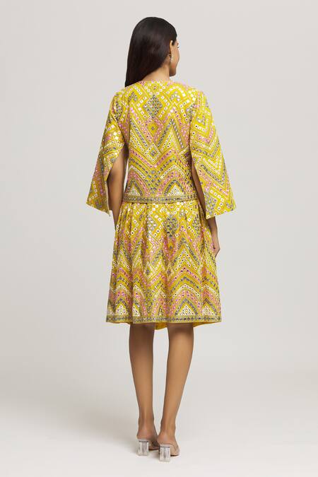 Shop Kunwarani Ritu Yellow Georgette Hand Embroidery Geometric Round Neck Top With Skirt at Aza Fashions Shop_Kunwarani Ritu_Yellow Georgette Hand Embroidery Geometric Round Neck Top With Skirt _at_Aza_Fashions