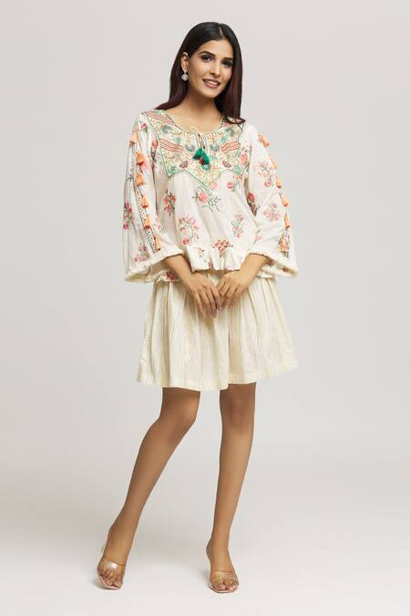 Kunwarani Ritu Cream Cotton Tassels, Embroidery Round Neck Floral Top With Skirt Online at Aza Fashions Kunwarani Ritu_Cream Cotton Tassels, Embroidery Round Neck Floral Top With Skirt _Online_at_Aza_Fashions