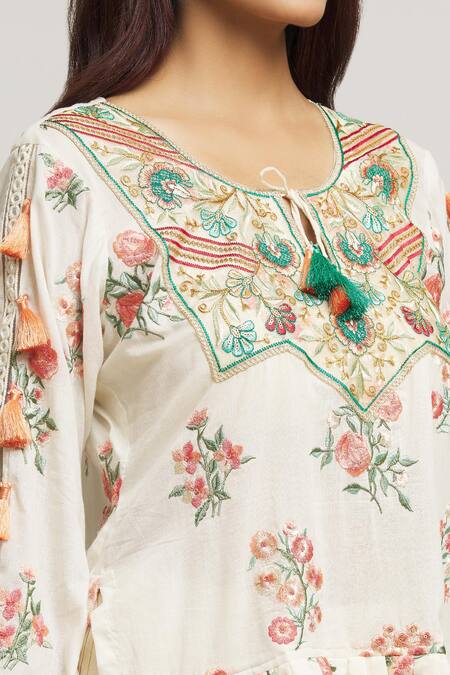 Buy Kunwarani Ritu Cream Cotton Tassels, Embroidery Round Neck Floral Top With Skirt Online at Aza Fashions Buy_Kunwarani Ritu_Cream Cotton Tassels, Embroidery Round Neck Floral Top With Skirt _Online_at_Aza_Fashions