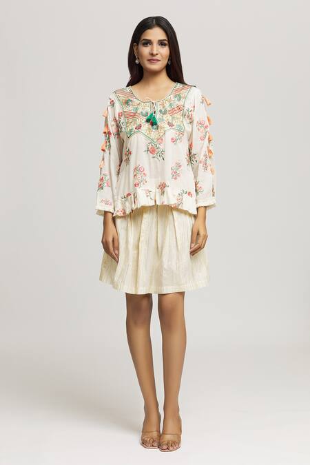 Kunwarani Ritu Cream Cotton Tassels, Embroidery Round Neck Floral Top With Skirt at Aza Fashions Kunwarani Ritu_Cream Cotton Tassels, Embroidery Round Neck Floral Top With Skirt _at_Aza_Fashions