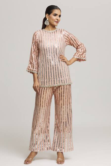 Buy Kunwarani Ritu Peach Georgette Embellished Sequins Round Neck Long Top With Pant Online at Aza Fashions Buy_Kunwarani Ritu_Peach Georgette Embellished Sequins Round Neck Long Top With Pant _Online_at_Aza_Fashions