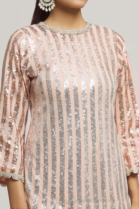 Shop Kunwarani Ritu Peach Georgette Embellished Sequins Round Neck Long Top With Pant Online at Aza Fashions Shop_Kunwarani Ritu_Peach Georgette Embellished Sequins Round Neck Long Top With Pant _Online_at_Aza_Fashions