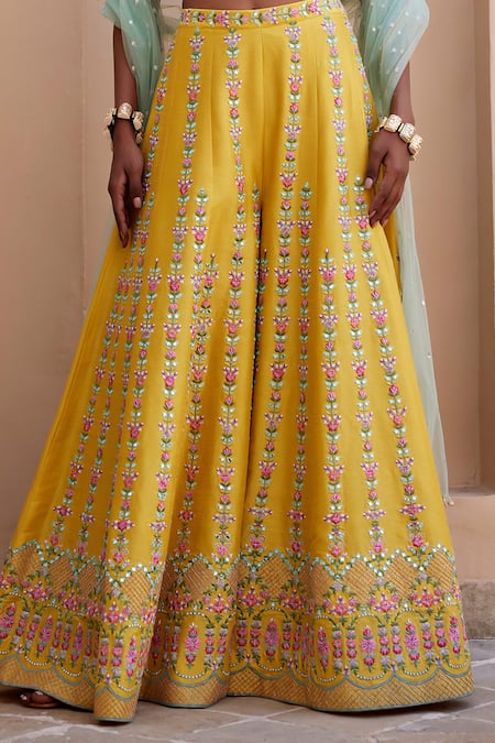 Chamee And Palak_Yellow Net, Silk Embroidery, Mirrors Halter Blossom And Resham Top Palazzo Set _at_Aza_Fashions