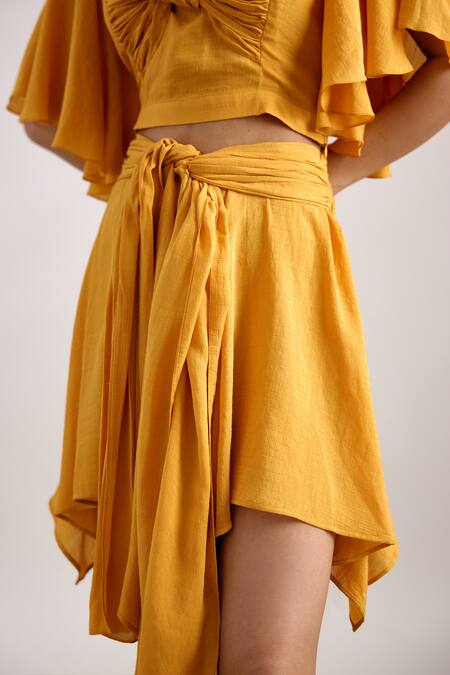 Shop Echostudio Yellow Linen, Crepe Halter Neck Knotted Draped Crop Top And Skirt Set Online at Aza Fashions Shop_Echostudio_Yellow Linen, Crepe Halter Neck Knotted Draped Crop Top And Skirt Set _Online_at_Aza_Fashions