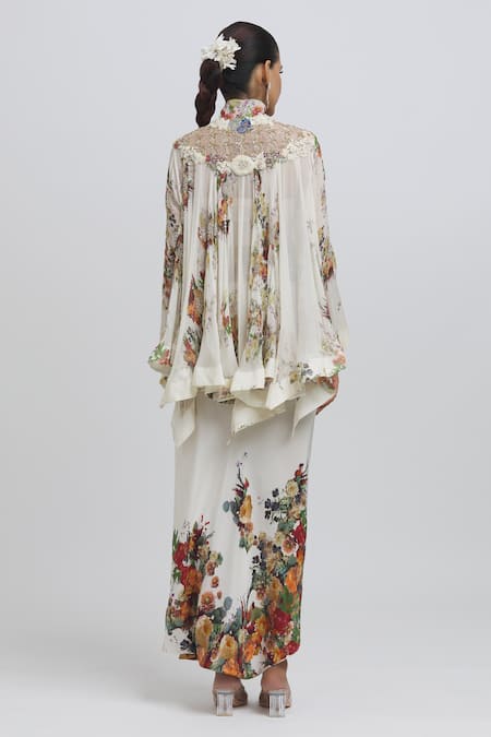 Shop Anamika Khanna White Silk Embroidery Mandarin Floral Pattern Kaftan Top And Draped Skirt Set at Aza Fashions Shop_Anamika Khanna_White Silk Embroidery Mandarin Floral Pattern Kaftan Top And Draped Skirt Set_at_Aza_Fashions