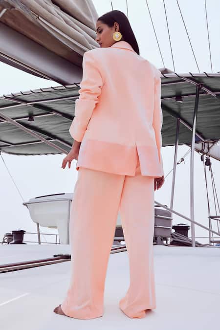 Shop Nirmooha Peach Microfiber Solid High Waist Baggy Pant at Aza Fashions Shop_Nirmooha_Peach Microfiber Solid High Waist Baggy Pant _at_Aza_Fashions