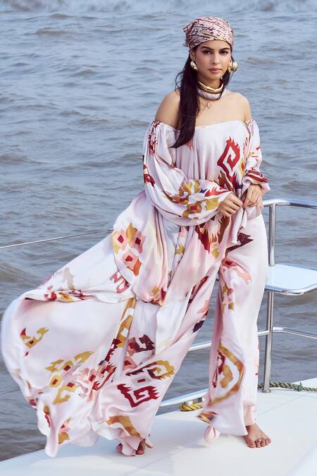 Nirmooha Peach Modal, Satin Embroidery Off-shoulder Patola Print Top Online at Aza Fashions Nirmooha_Peach Modal, Satin Embroidery Off-shoulder Patola Print Top _Online_at_Aza_Fashions