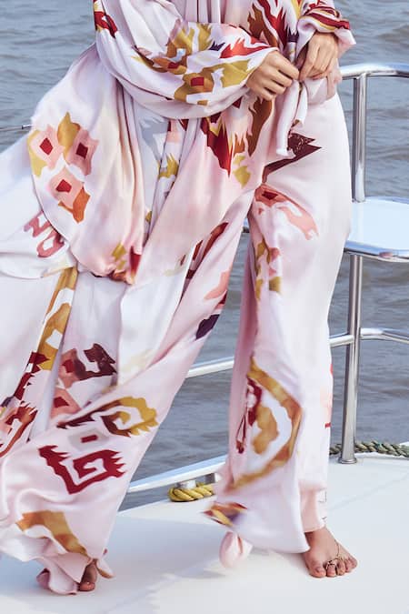 Nirmooha_Peach Modal, Satin Embroidery Patola Print Flared Pant _Online_at_Aza_Fashions